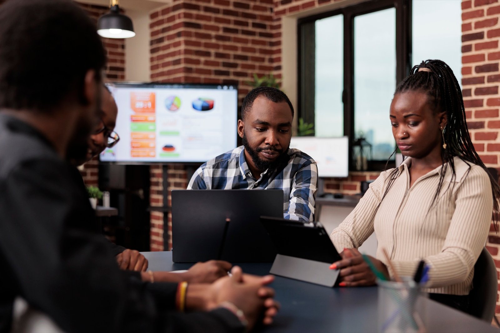 A diverse team working together on digital ideas